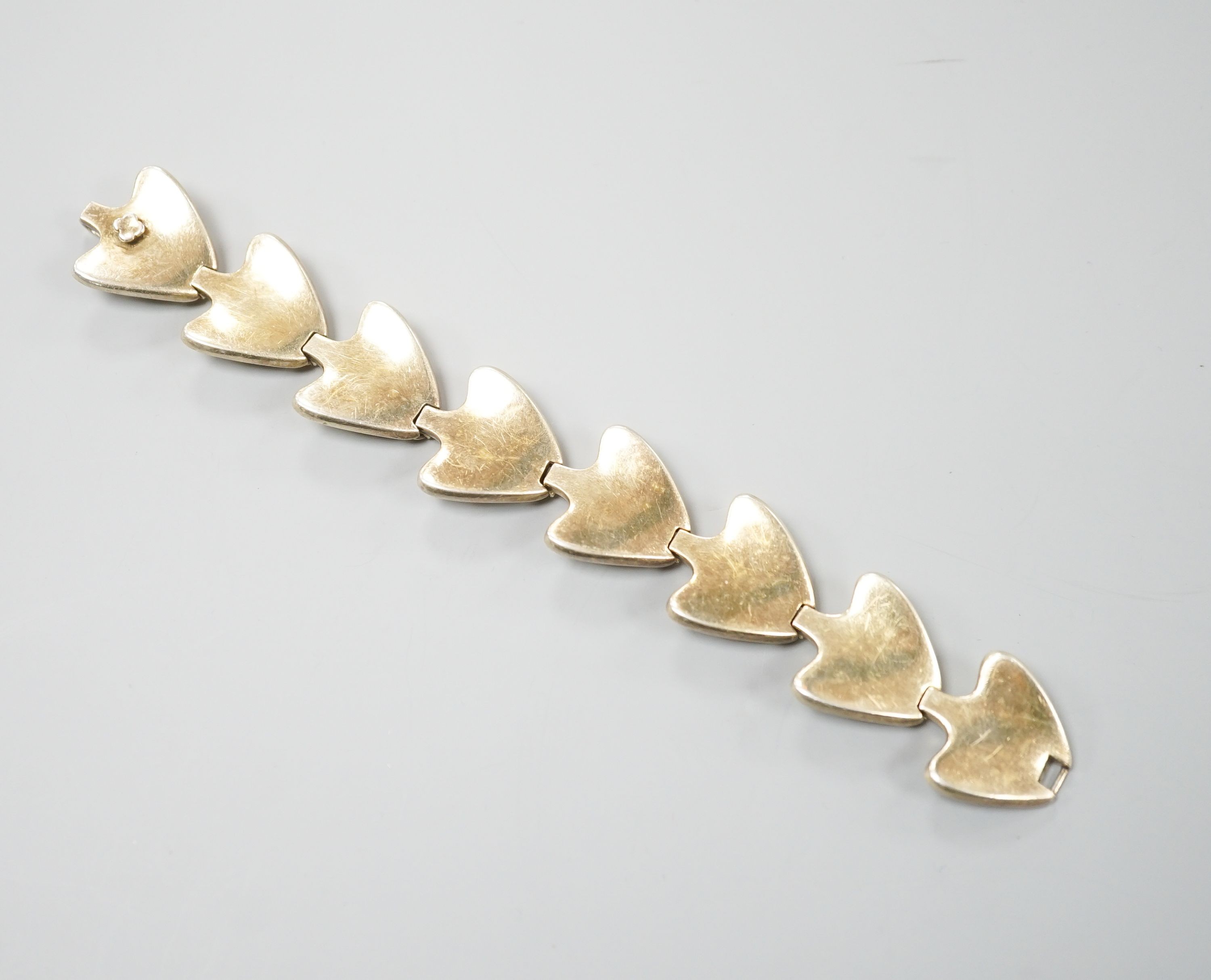 A 20th century Danish gilt sterling bracelet by Bent Knudson, 18.3cm.